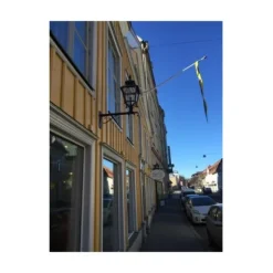 Eriksberg vägglykta m smidesarm, koppar/svart