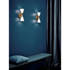 Harlekin vägglampa Duo mässing E14